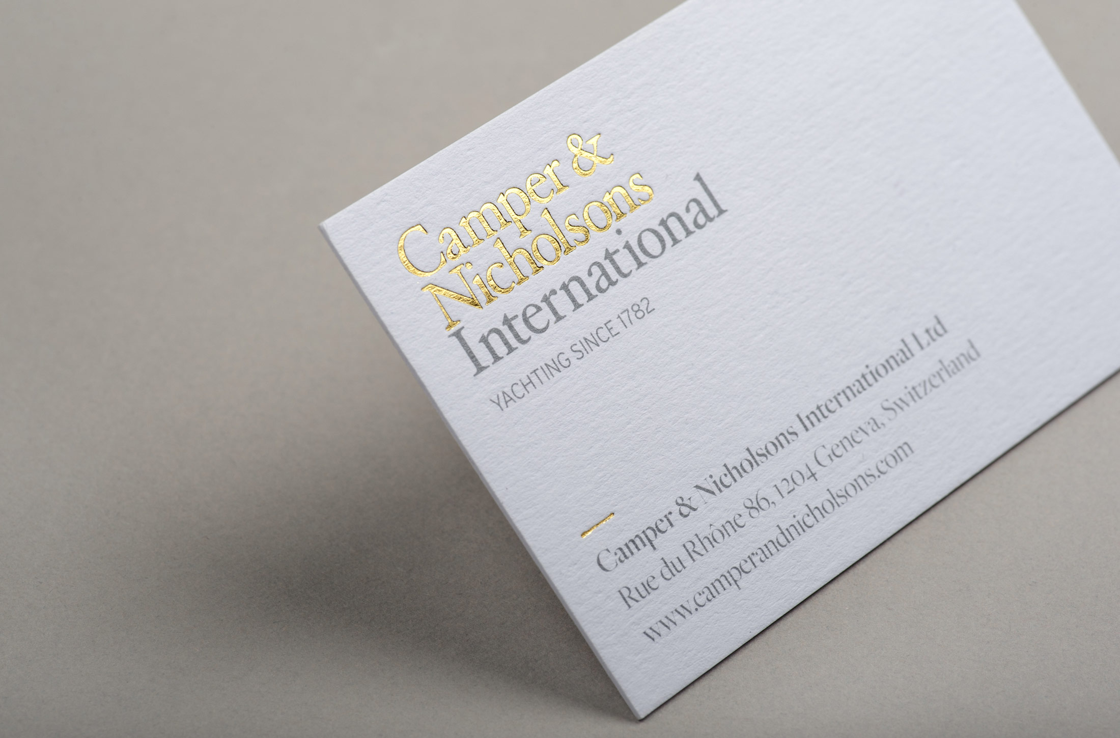 Camper & Nicholsons International business card